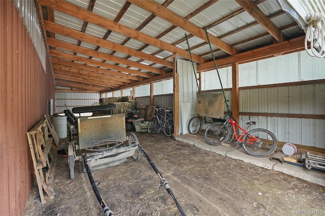 8875 N Lakola Rd, Tustin, MI 49688 - garage featuring metal wall