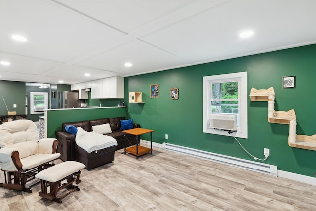 3701 3 1/2 Mile Rd, Athens, MI 49011 - living room featuring a baseboard radiator, recessed lighting, baseboards, and plenty of natural light
