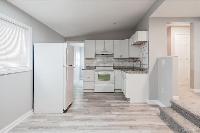 38204 Main St, New Baltimore, MI 48047 - kitchen featuring white appliances, a sink, under cabinet range hood, vaulted ceiling, and backsplash
