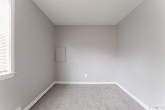 38204 Main St, New Baltimore, MI 48047 - empty room featuring carpet flooring and baseboards