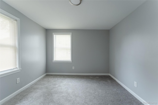38204 Main St, New Baltimore, MI 48047 - carpeted spare room with baseboards