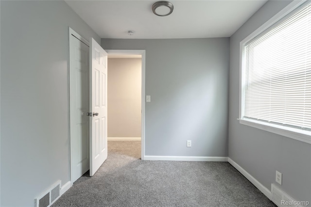 38204 Main St, New Baltimore, MI 48047 - unfurnished room with carpet flooring and baseboards
