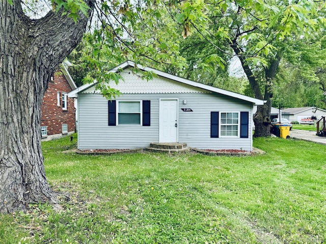 38204 Main St, New Baltimore, MI 48047 - view of front facade featuring a front yard