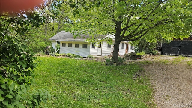 5820 Mack Rd, Howell, MI 48855 - view of property hidden behind natural elements