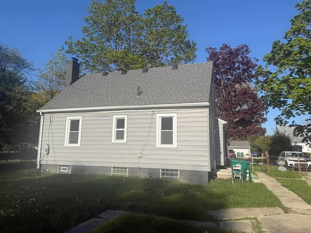 2019 Helen St, Garden City, MI 48135 - back of property featuring a chimney and a shingled roof