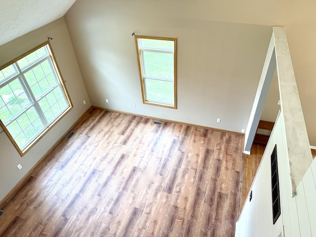 6981 Jennifer Ln, Portland, MI 48875 - bonus room with wood finished floors and baseboards