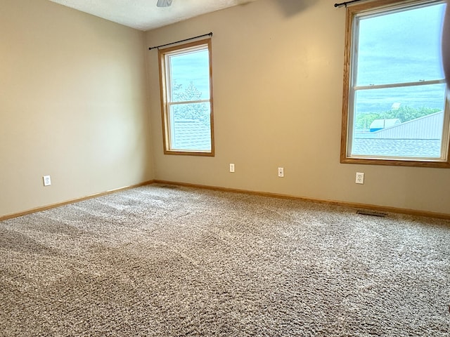 6981 Jennifer Ln, Portland, MI 48875 - carpeted spare room featuring baseboards
