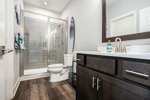 18734 Leonard Ct, New Buffalo, MI 49117 - full bath with vanity, toilet, wood finished floors, and a stall shower