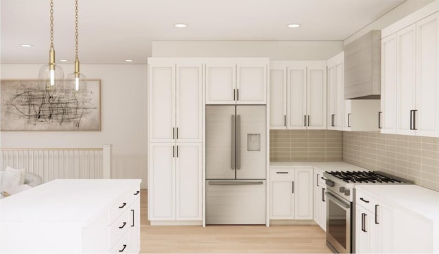 638 E Fulton St E Unit C2, Grand Rapids, MI 49503 - kitchen with built in fridge, stainless steel gas range oven, light wood-type flooring, light countertops, and decorative backsplash