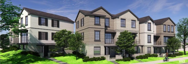 638 E Fulton St E Unit C2, Grand Rapids, MI 49503 - view of front of property featuring a front yard