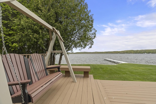 5384 Indian Trl, Frankfort, MI 49635 - wooden terrace with a water view and a yard