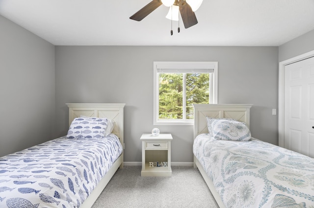 5384 Indian Trl, Frankfort, MI 49635 - bedroom with carpet flooring, baseboards, and ceiling fan