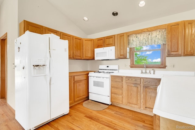 5562 Sheridan Line Rd, Croswell, MI 48422 - kitchen with white appliances, light countertops, lofted ceiling, light wood-style floors, and recessed lighting