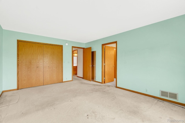 5562 Sheridan Line Rd, Croswell, MI 48422 - unfurnished bedroom featuring a closet and carpet flooring