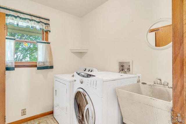 5562 Sheridan Line Rd, Croswell, MI 48422 - laundry room featuring washer and clothes dryer and baseboards