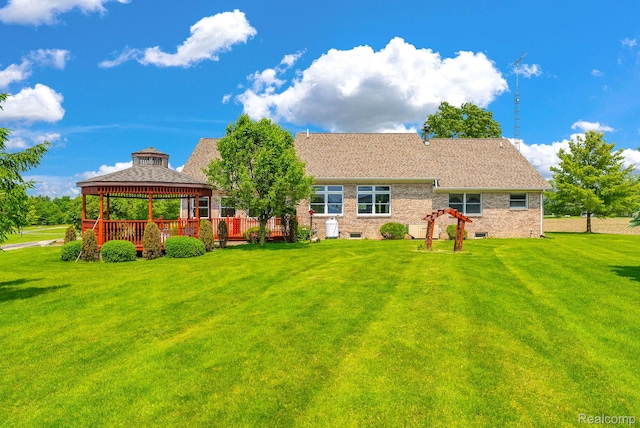 5562 Sheridan Line Rd, Croswell, MI 48422 - rear view of property featuring a gazebo and a lawn