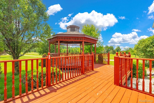 5562 Sheridan Line Rd, Croswell, MI 48422 - deck featuring a gazebo and a lawn