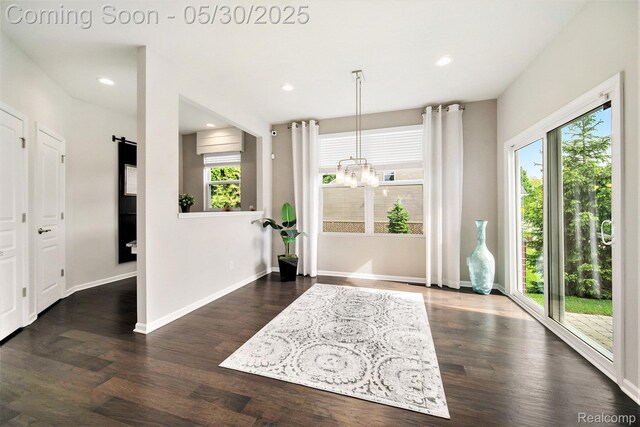 2979 Havre St, Ann Arbor, MI 48105 - foyer entrance featuring healthy amount of natural light, a chandelier, dark wood-style flooring, baseboards, and recessed lighting
