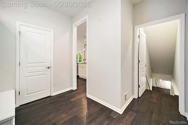 2979 Havre St, Ann Arbor, MI 48105 - hallway with dark wood-style flooring and baseboards