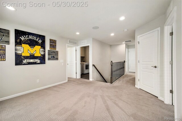 2979 Havre St, Ann Arbor, MI 48105 - empty room featuring carpet, washer / dryer, recessed lighting, and baseboards