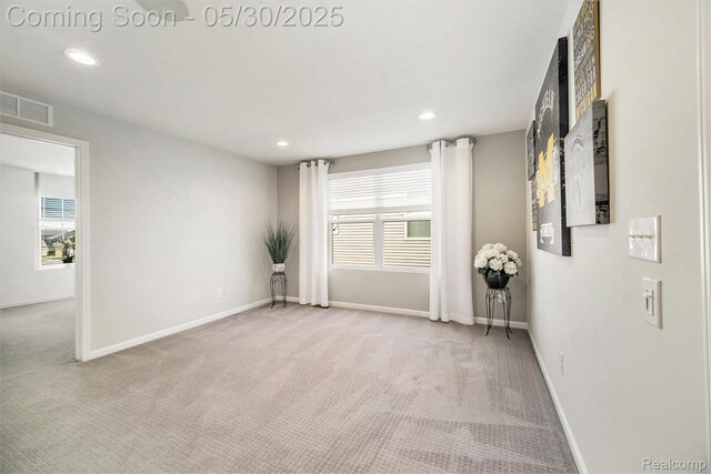 2979 Havre St, Ann Arbor, MI 48105 - empty room featuring light colored carpet, plenty of natural light, baseboards, and recessed lighting