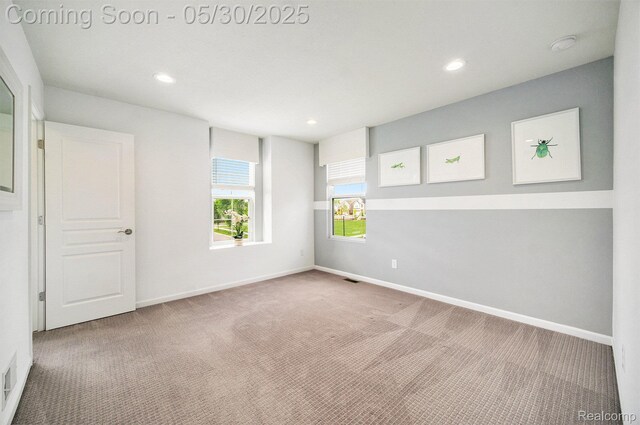 2979 Havre St, Ann Arbor, MI 48105 - carpeted empty room featuring baseboards, recessed lighting, and a smoke detector