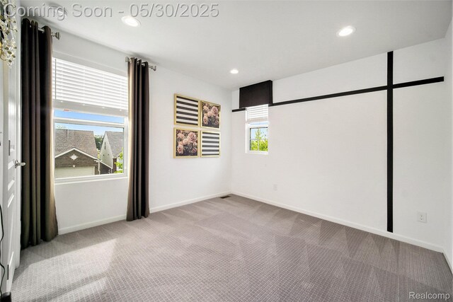 2979 Havre St, Ann Arbor, MI 48105 - carpeted spare room featuring baseboards and recessed lighting