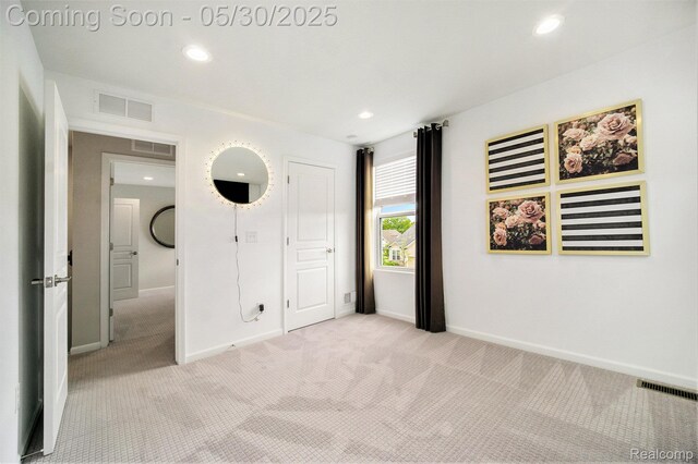 2979 Havre St, Ann Arbor, MI 48105 - unfurnished bedroom with light colored carpet, baseboards, and recessed lighting