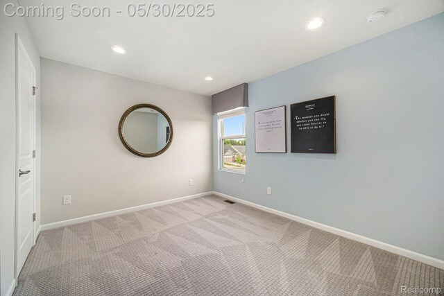 2979 Havre St, Ann Arbor, MI 48105 - empty room featuring light carpet, baseboards, recessed lighting, and a smoke detector