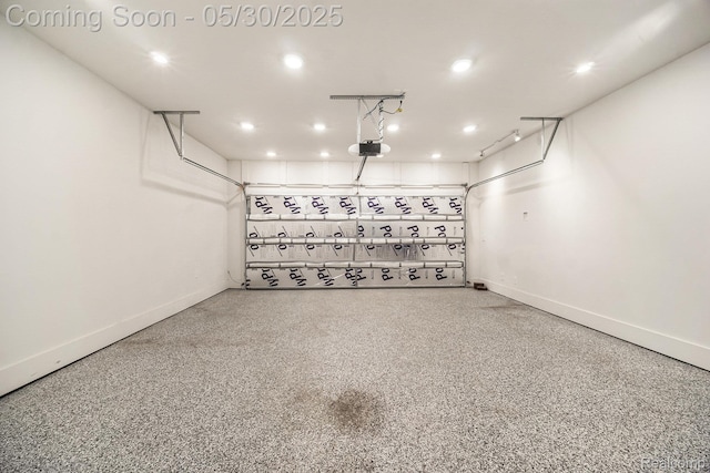 2979 Havre St, Ann Arbor, MI 48105 - garage with recessed lighting, baseboards, and a garage door opener