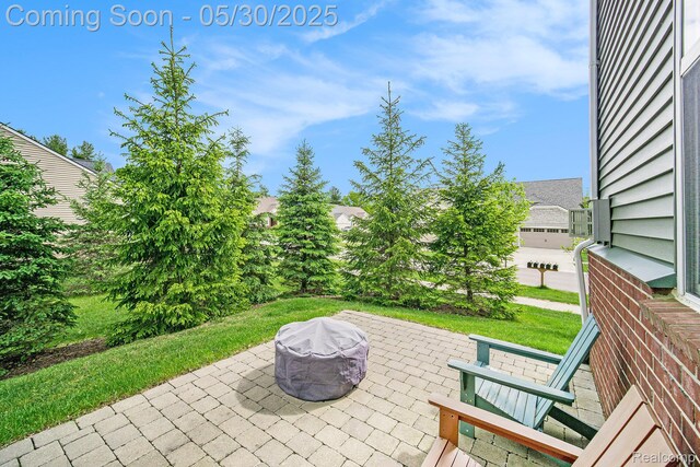 2979 Havre St, Ann Arbor, MI 48105 - view of patio with an outdoor fire pit