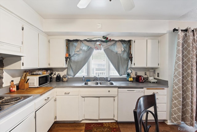 3307 Mackin Rd, Flint, MI 48504 - kitchen featuring a sink, white appliances, white cabinetry, a ceiling fan, and dark wood-type flooring