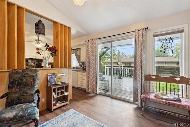 3307 Mackin Rd, Flint, MI 48504 - sitting room featuring lofted ceiling, wood finished floors, and a ceiling fan