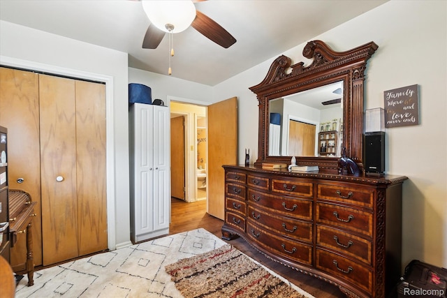 3307 Mackin Rd, Flint, MI 48504 - bedroom with a closet, wood finished floors, and ceiling fan