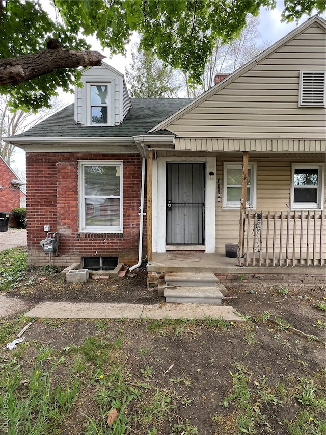 11106 Nottingham Rd, Detroit, MI 48224 - view of front of property featuring covered porch and brick siding