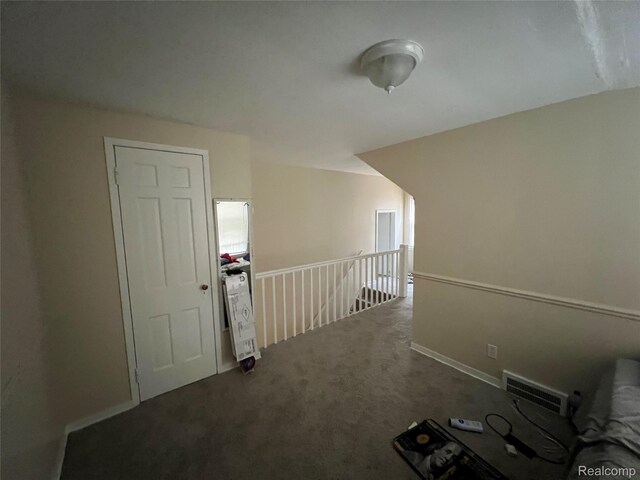 11106 Nottingham Rd, Detroit, MI 48224 - hallway with carpet and an upstairs landing