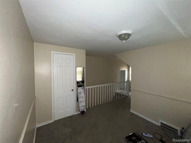 11106 Nottingham Rd, Detroit, MI 48224 - carpeted empty room with baseboards