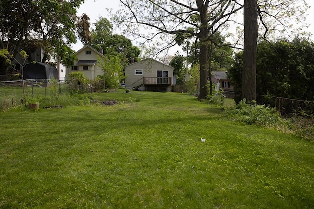 1429 Vine St, Lansing, MI 48912 - view of yard featuring a wooden deck