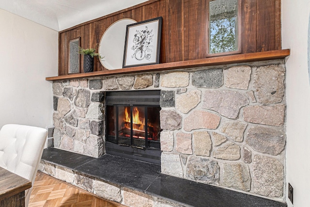135 Barton Dr, Ann Arbor, MI 48105 - detailed view of a stone fireplace and wood walls