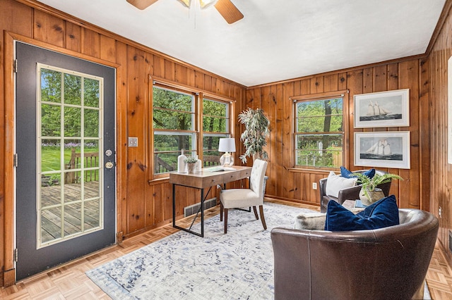 135 Barton Dr, Ann Arbor, MI 48105 - office space featuring wood walls, a ceiling fan, and baseboards