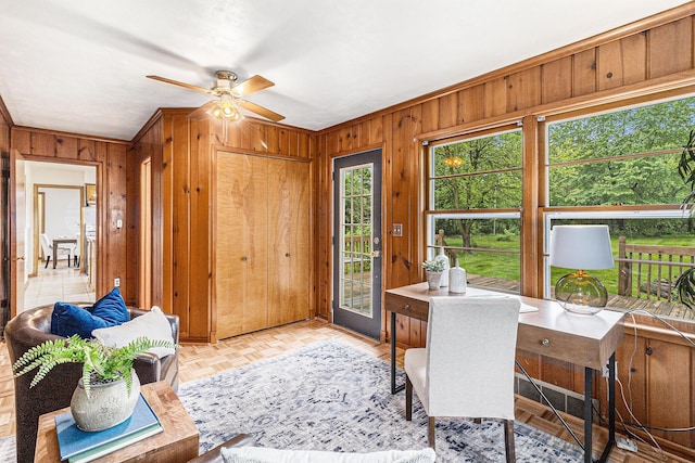 135 Barton Dr, Ann Arbor, MI 48105 - home office featuring wooden walls and a ceiling fan
