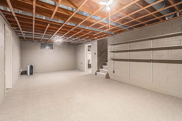 135 Barton Dr, Ann Arbor, MI 48105 - unfinished basement featuring stairway and carpet floors
