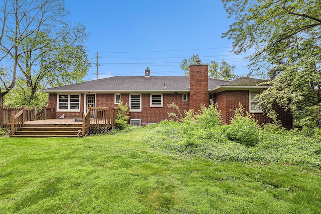135 Barton Dr, Ann Arbor, MI 48105 - rear view of house featuring a chimney, a wooden deck, brick siding, and cooling unit