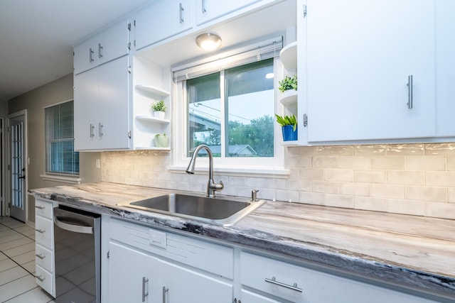 538 Monterey Dr, Benton Harbor, MI 49022 - kitchen with open shelves, a sink, tile patterned flooring, and decorative backsplash