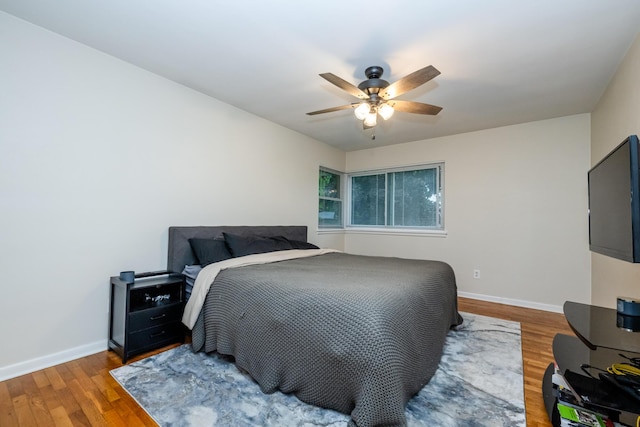 538 Monterey Dr, Benton Harbor, MI 49022 - bedroom featuring wood finished floors, baseboards, and a ceiling fan