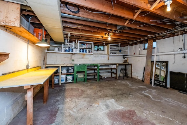 538 Monterey Dr, Benton Harbor, MI 49022 - unfinished basement with a workshop area