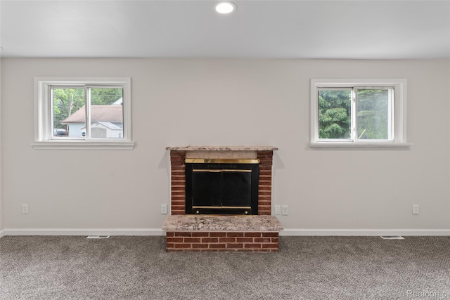 30542 Bretton St, Livonia, MI 48152 - detailed view of carpet flooring, baseboards, a fireplace, and recessed lighting