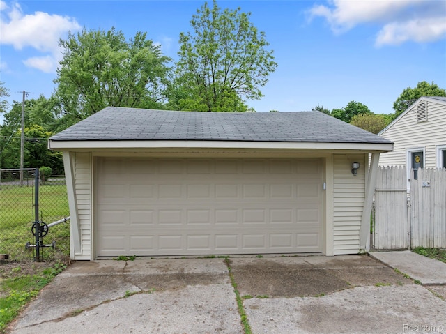 30542 Bretton St, Livonia, MI 48152 - detached garage featuring a gate