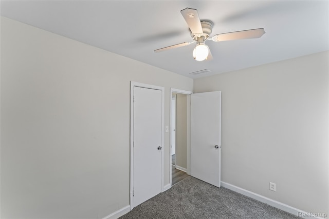 30542 Bretton St, Livonia, MI 48152 - unfurnished bedroom with carpet floors, baseboards, and ceiling fan