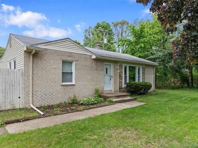 30542 Bretton St, Livonia, MI 48152 - single story home with a chimney and brick siding